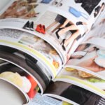 Brochure printing guide - stack of open brochures